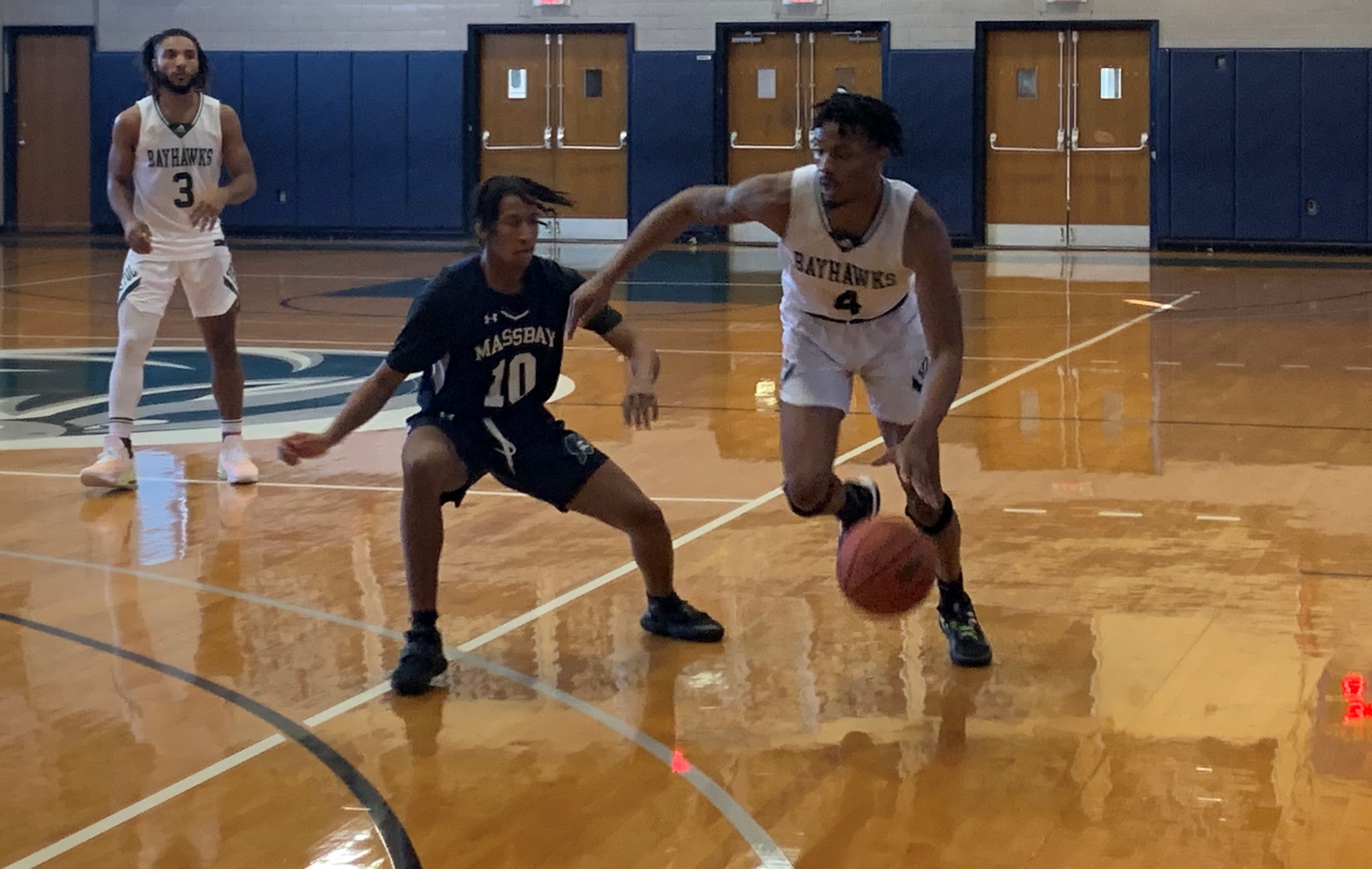 Bayhawks Battle Mass Bay to 63-50 Victory